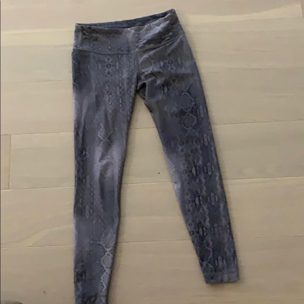 With snakeskin leggings size small